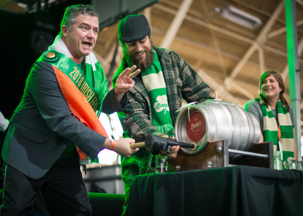 Davey D with a local councilor tapping the ceremonial cask